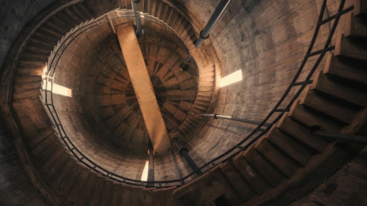 Discover a mesmerizing spiral staircase in Trujillo, Peru, showcasing rustic architecture.