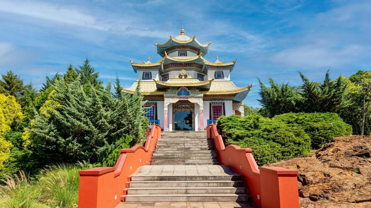Scenic view of Khadro Ling Buddhist Temple, showcasing traditional Tibetan architecture in Tres Coroas, Brazil.