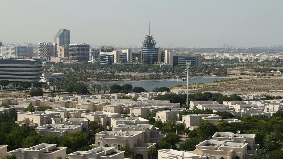 A scenic aerial view of Dubai Silicon Oasis with modern architecture and lush greenery.
