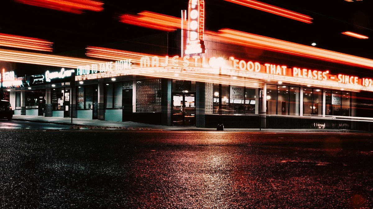Abstract night shot of Majestic Diner with vibrant light trails in Atlanta.
