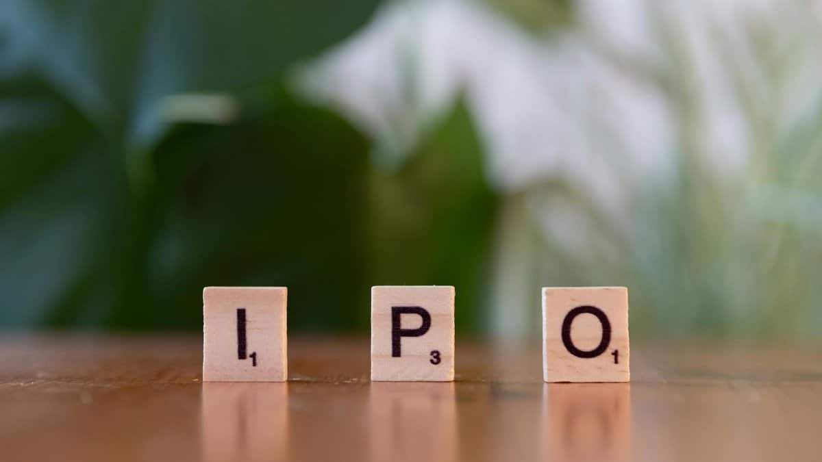 Wooden letter blocks spelling IPO on a table, symbolizing investment opportunities.