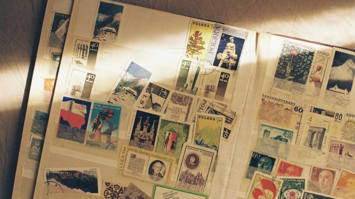 A detailed look at a vintage collection of international stamps displayed in an album.