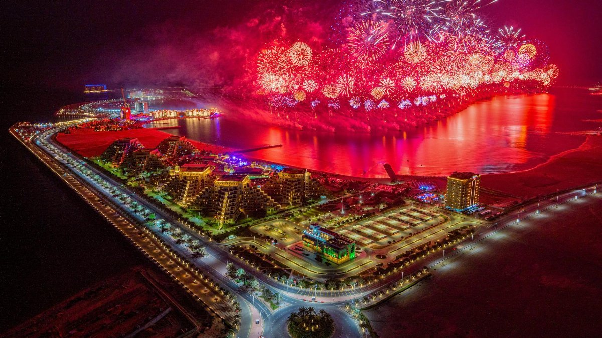 Spectacular fireworks display over Al Marjan Island, Ras Al Khaimah celebrating New Year's Eve.