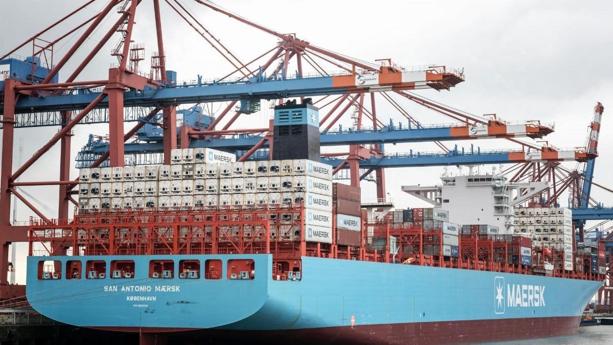 Container ship docked at the Port of Hamburg, showcasing industrial logistics.