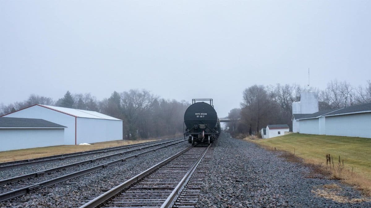 A freight train on a misty railway track in Wabasha, Minnesota.