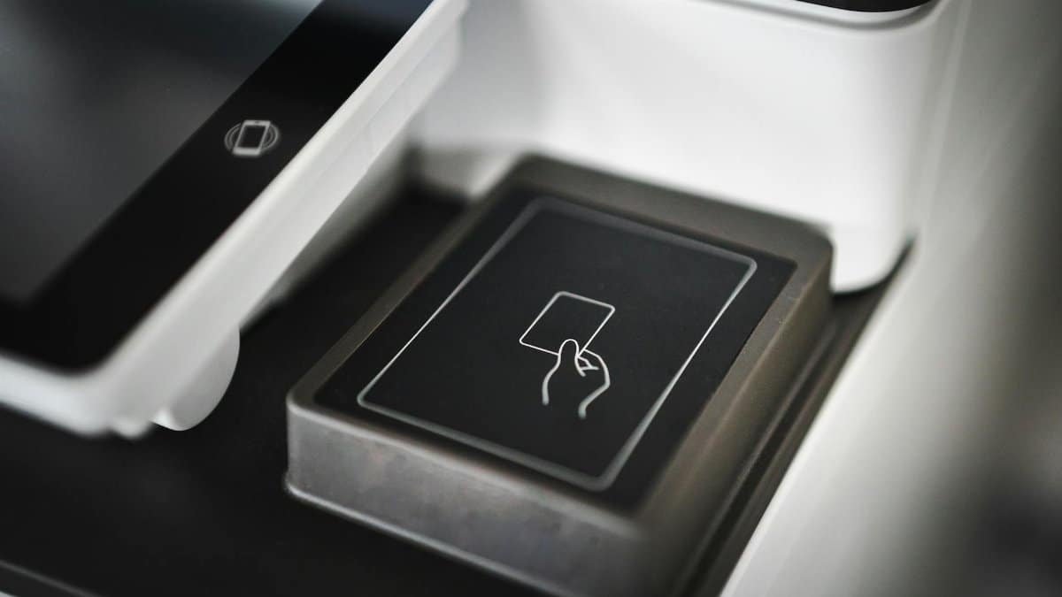 Close-up view of a modern contactless payment terminal for seamless transactions.