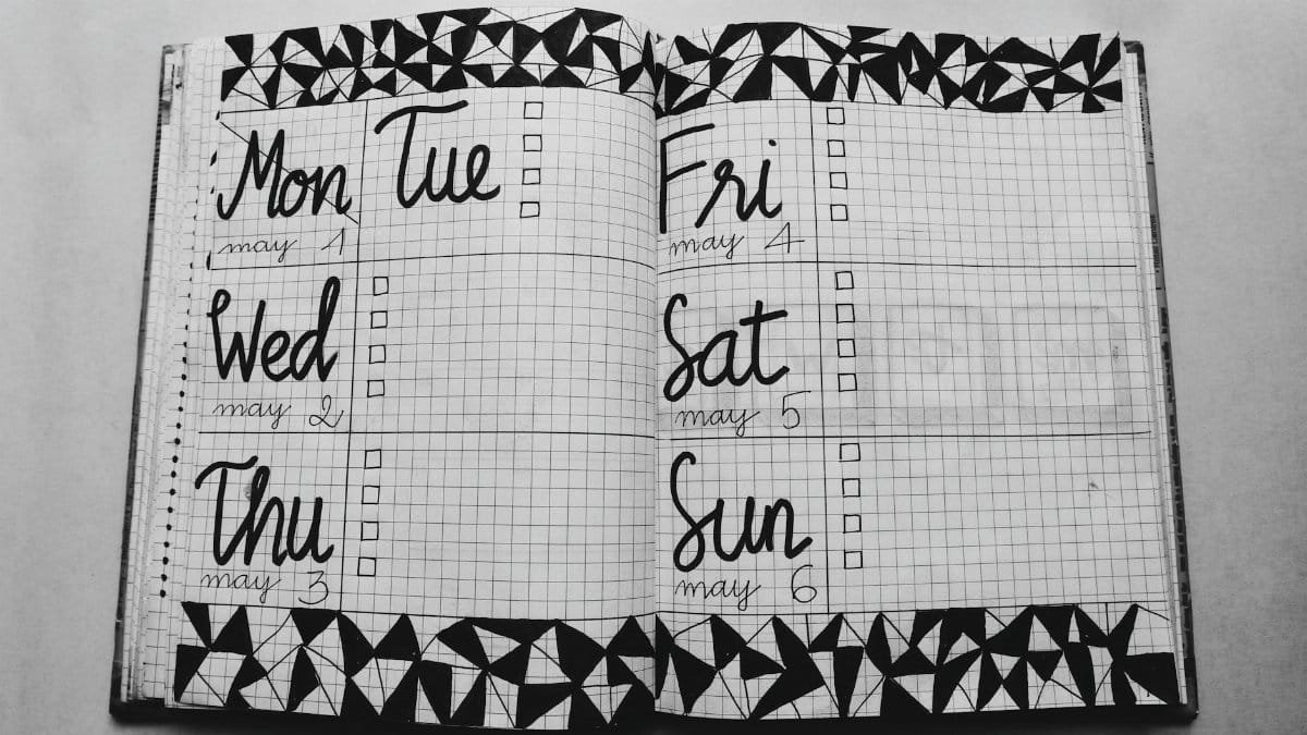 Monochrome weekly planner featuring hand-drawn geometric patterns and days of the week.