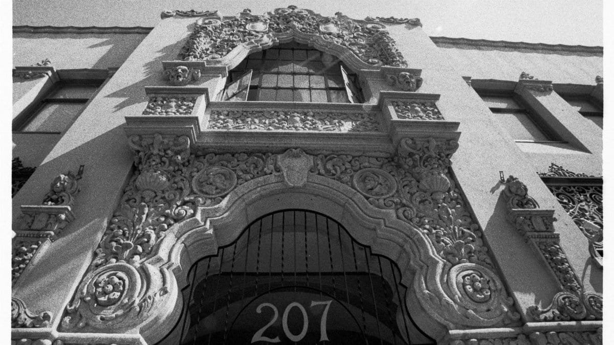 Black and white image of a detailed ornate facade in Santa Ana showcasing Moorish architecture.