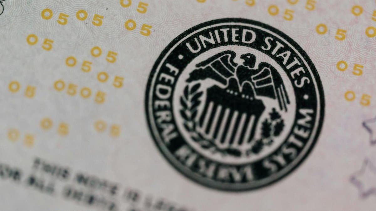 Detailed macro shot of the United States Federal Reserve System seal on paper currency.