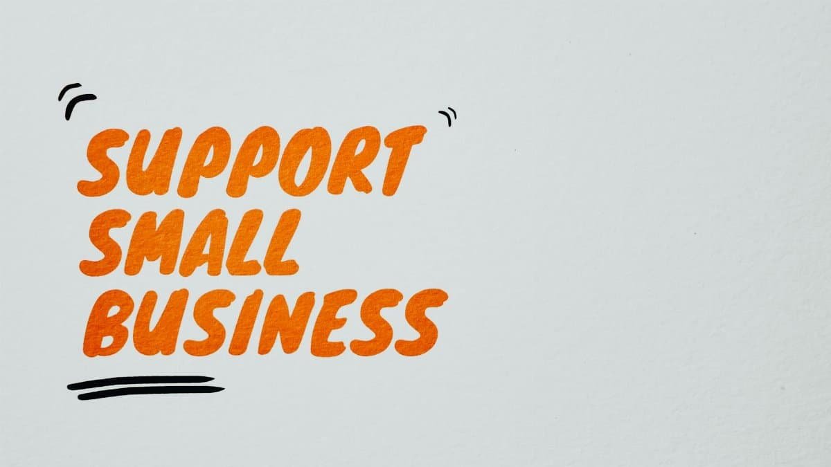 Inspiring text promoting small businesses on a light background.