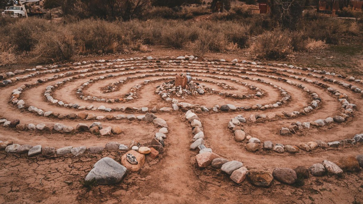Explore the intricate rock labyrinth in the arid landscape of Ojo Caliente, New Mexico.