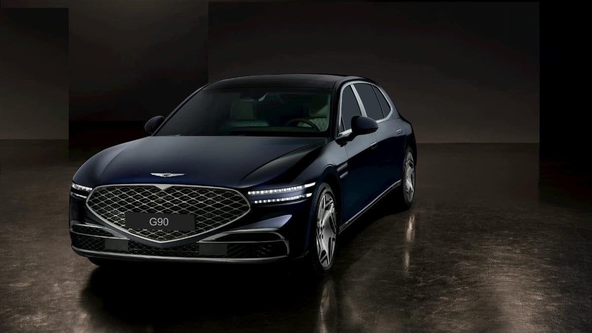 Elegant Genesis G90 luxury sedan showcased in a sleek, dark environment. Perfect for car enthusiasts.