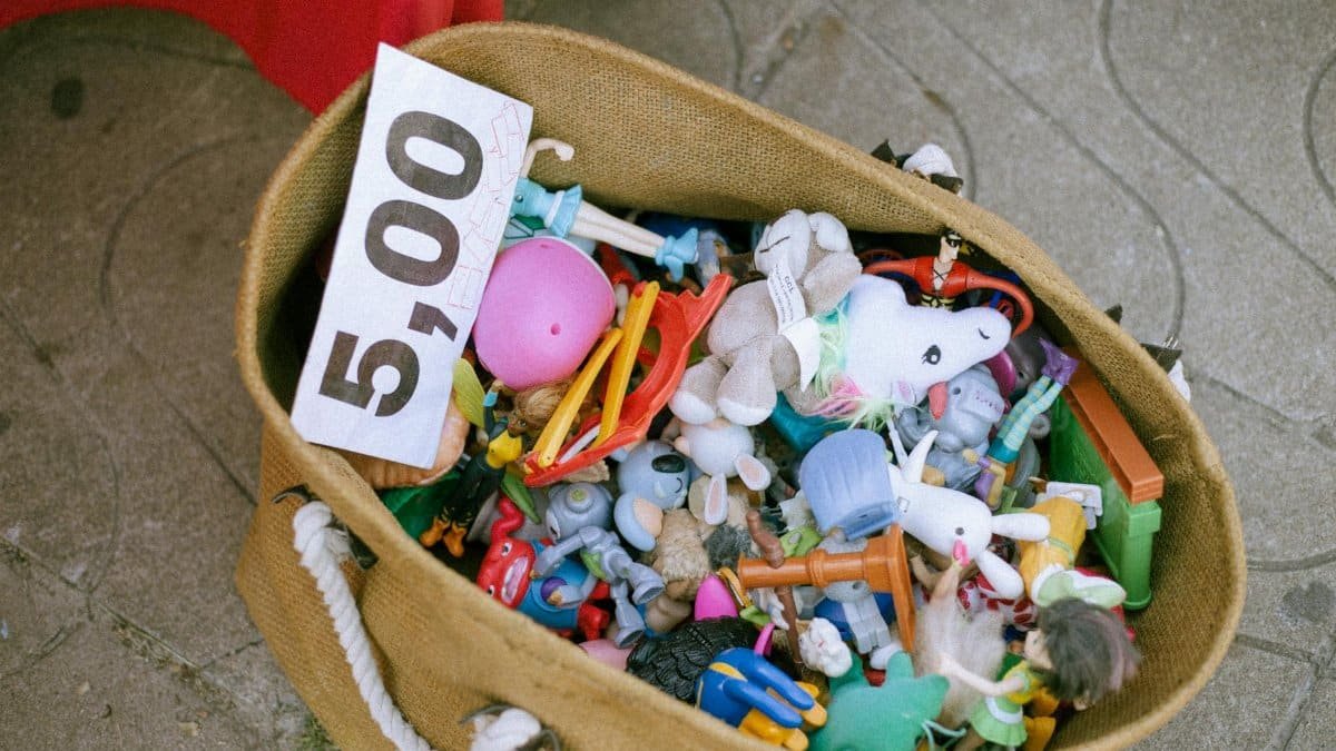 A bag of various toys priced at 5.00 euros displayed at a market.