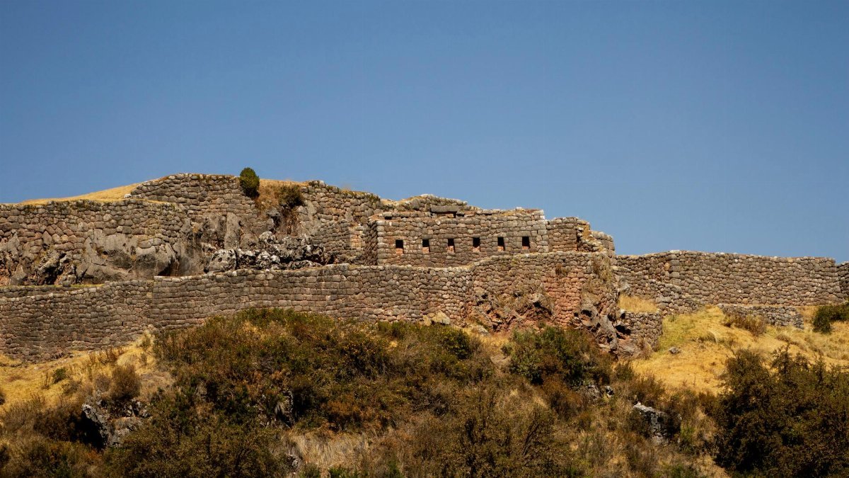 Majestic stone ruins in Cusco, Peru showcase ancient architectural prowess.