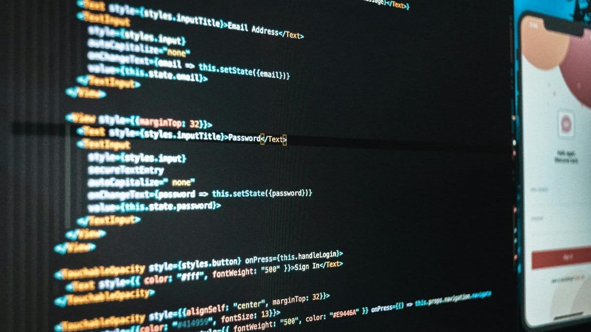 Detailed close-up view of programming code on a computer screen, showcasing a web application interface.