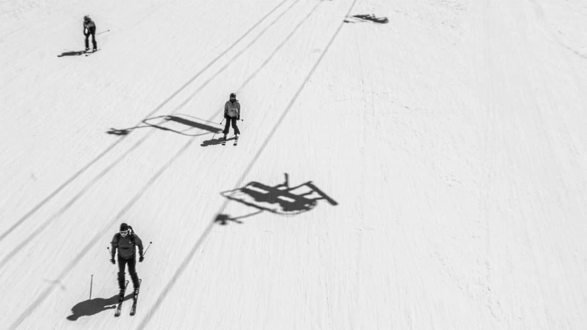 Aerial view of skiers enjoying a winter day on the slopes of Vail, Colorado.
