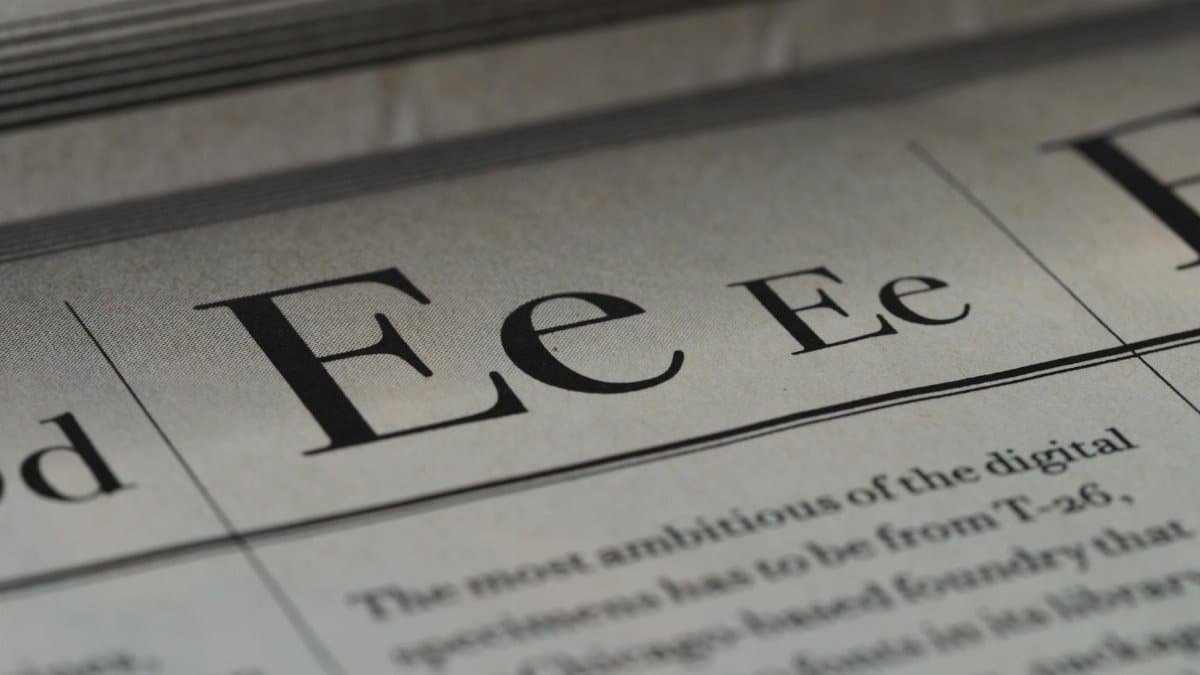 Artistic close-up of typography on newspaper with selective focus.