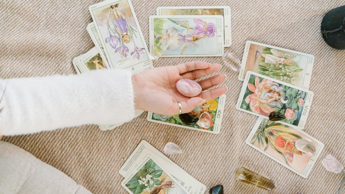 A serene setup of tarot cards and crystals invites insight and introspection.