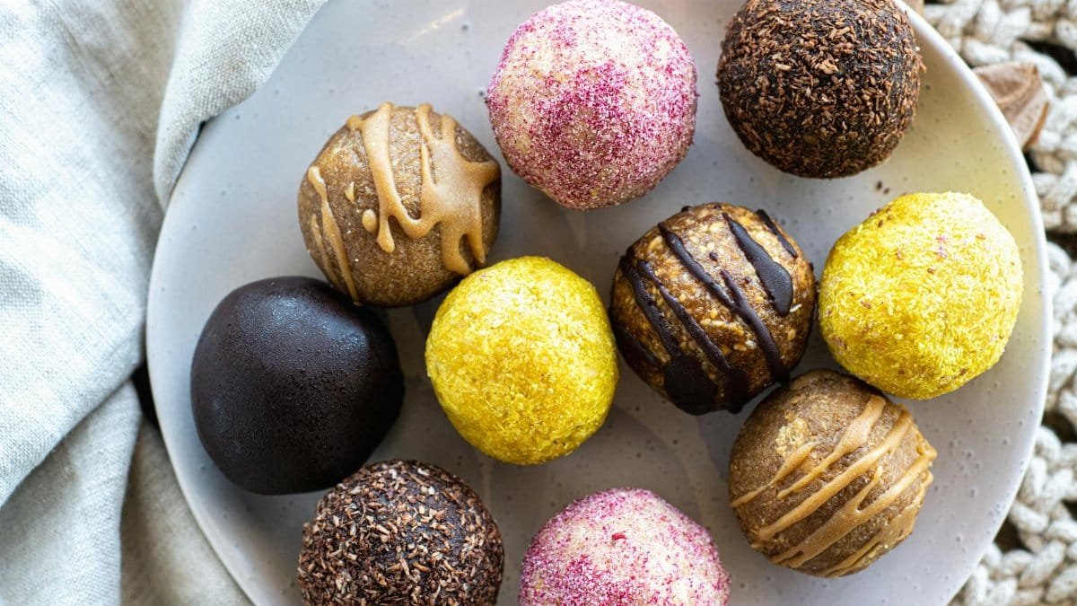 A vibrant selection of homemade protein energy balls perfect for a healthy snack.