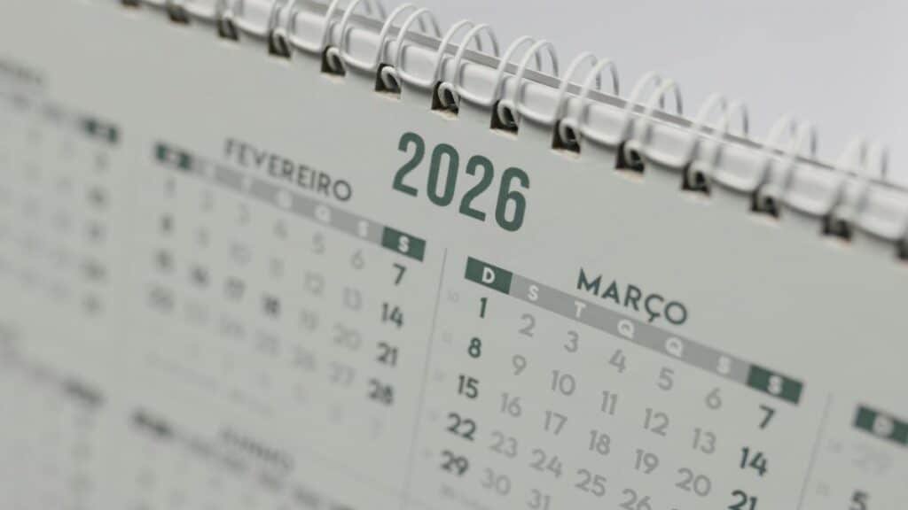 Close-up view of a 2026 spiral-bound desk calendar showing February and March.