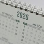 Close-up view of a 2026 spiral-bound desk calendar showing February and March.