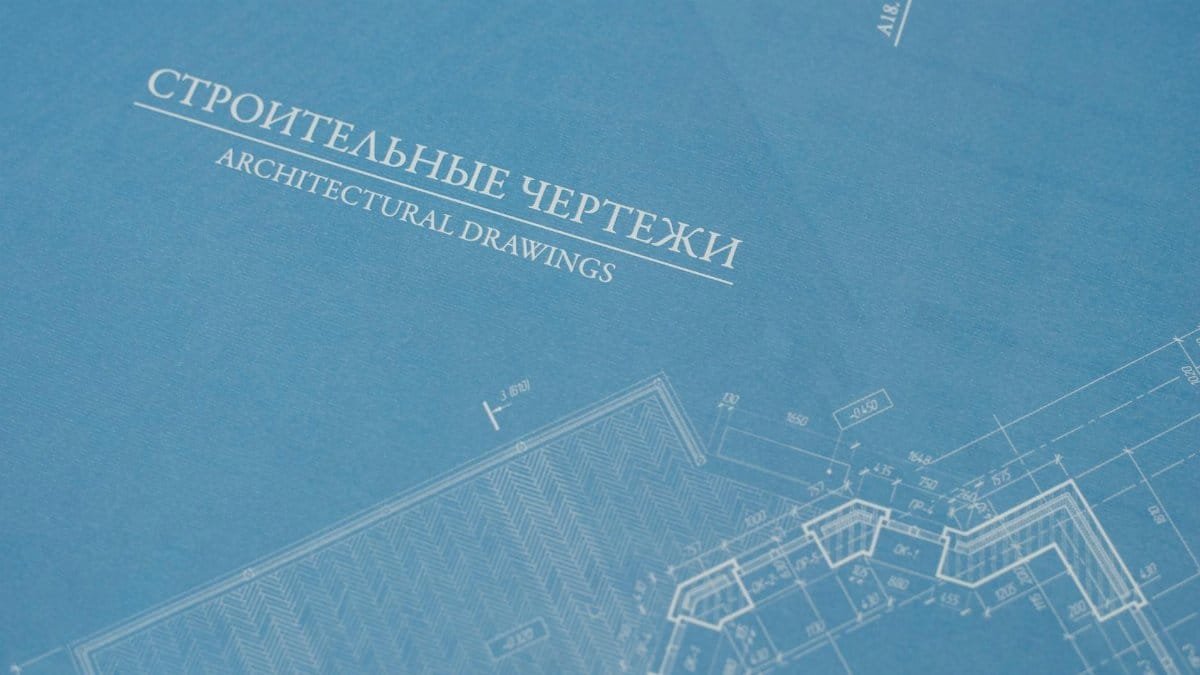 Close-up of detailed blueprints highlighting architectural design elements.