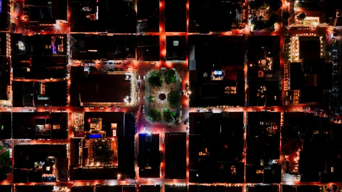 Stunning aerial view of Panama City's illuminated streets at night.