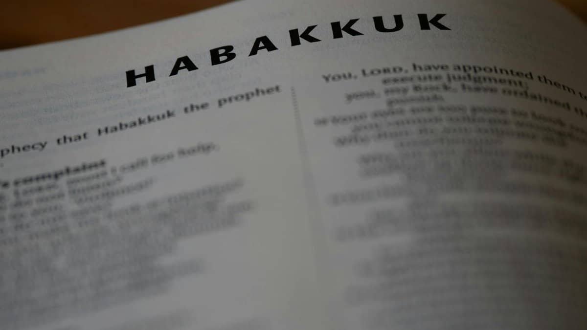 Close view of the Habakkuk page in the Bible, focusing on text details.