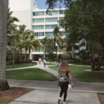A vibrant university campus scene in Coral Gables, Florida showcasing college life on a sunny day.
