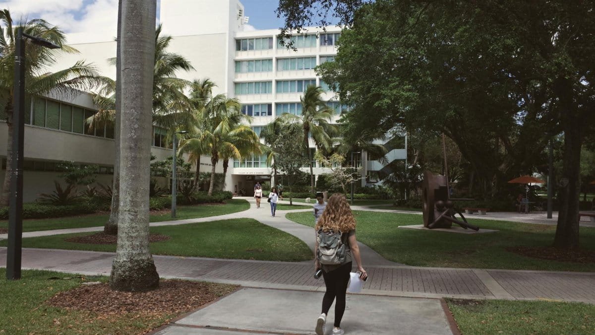 A vibrant university campus scene in Coral Gables, Florida showcasing college life on a sunny day.