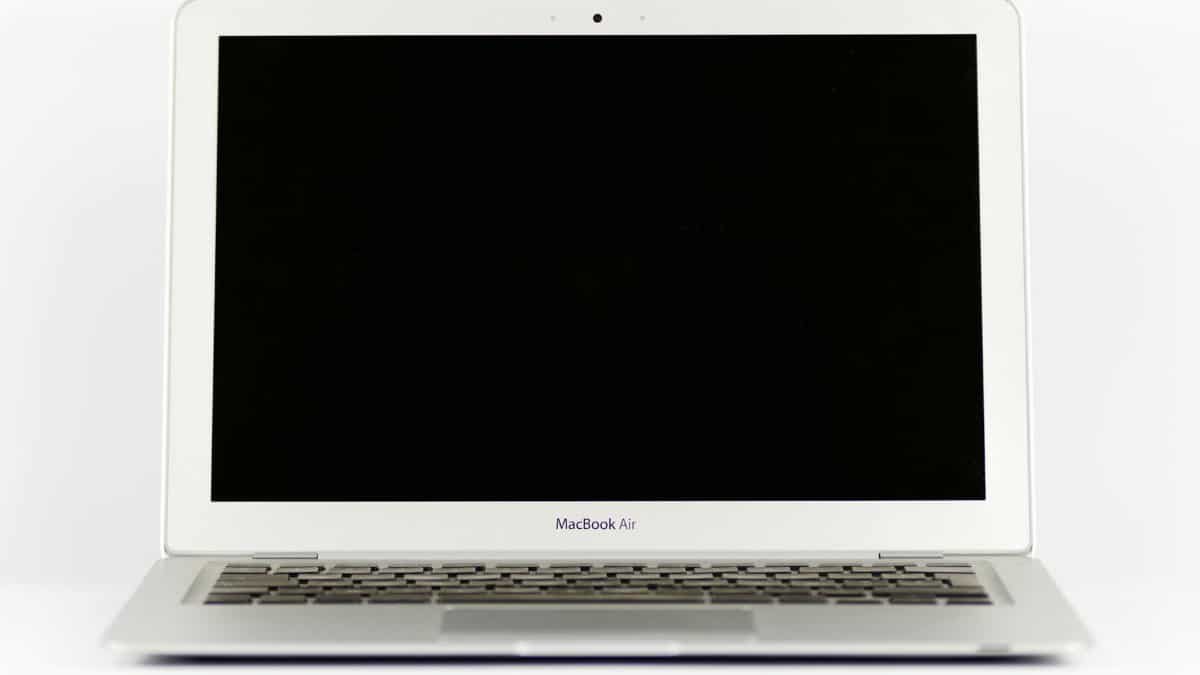 Front view of a MacBook Air laptop with a blank screen on a white background.