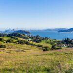 Beautiful view of San Francisco Bay from Marin County with city skyline and rolling hills.