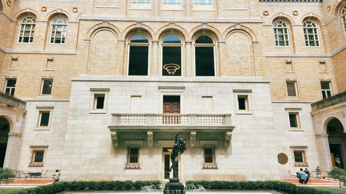 Stunning historic architecture and fountain at Boston Public Library courtyard.