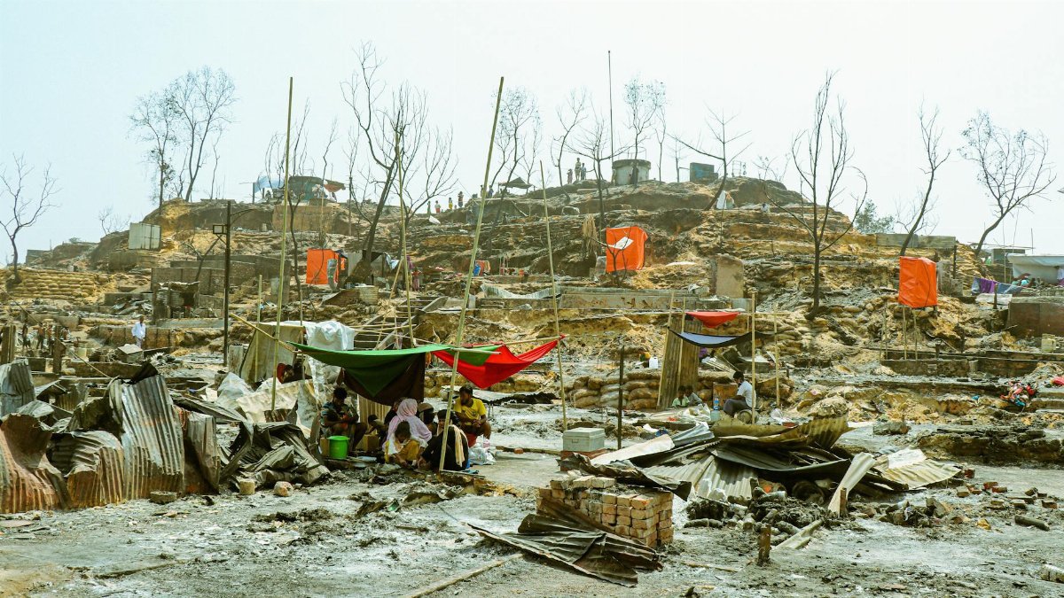 Scene of destruction in a refugee camp after a fire in Cox's Bazar, Bangladesh.