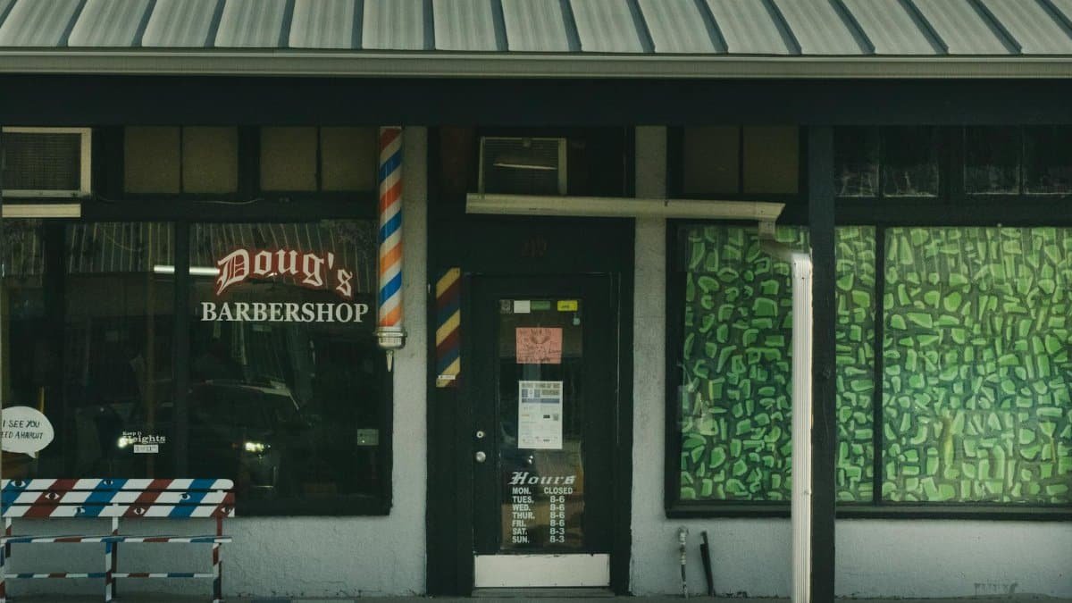A charming vintage barbershop exterior in Houston, Texas, capturing nostalgia and local culture.