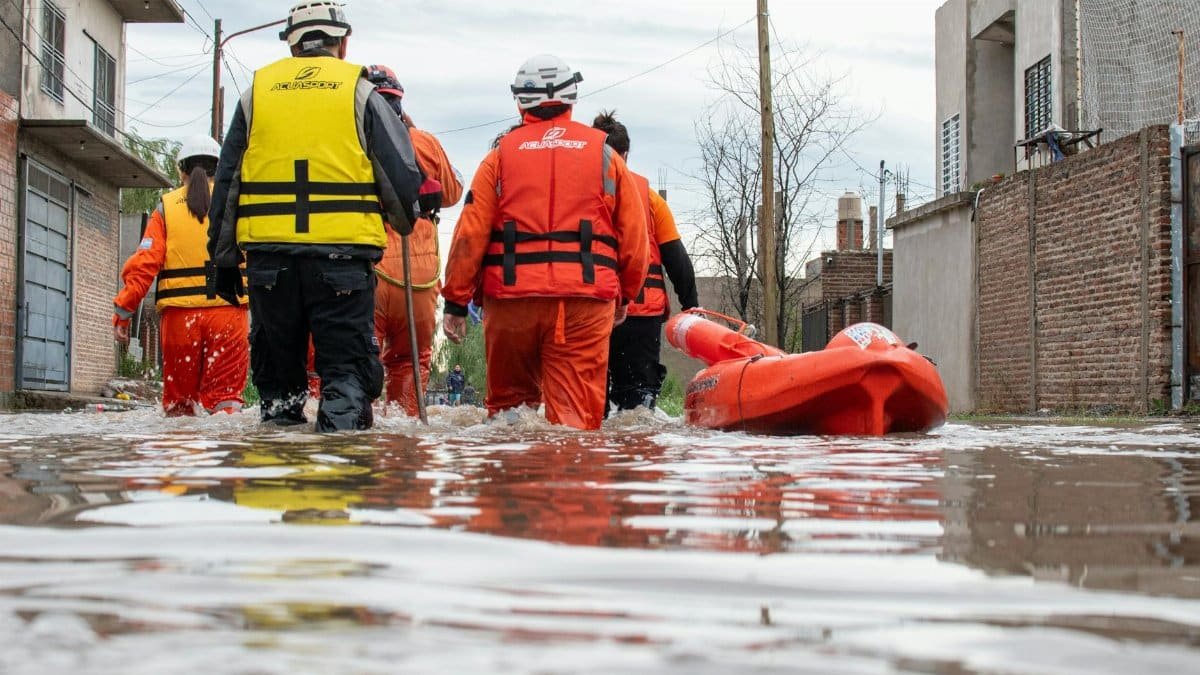 Rescue team in action during flooding in Buenos Aires, aiding relief efforts in affected neighborhoods.