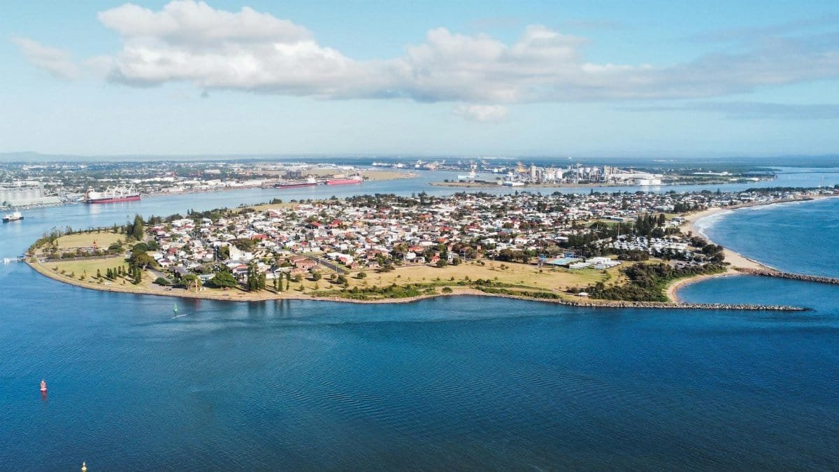 Stunning aerial view of Newcastle, NSW showcasing coastal beauty and urban skyline.