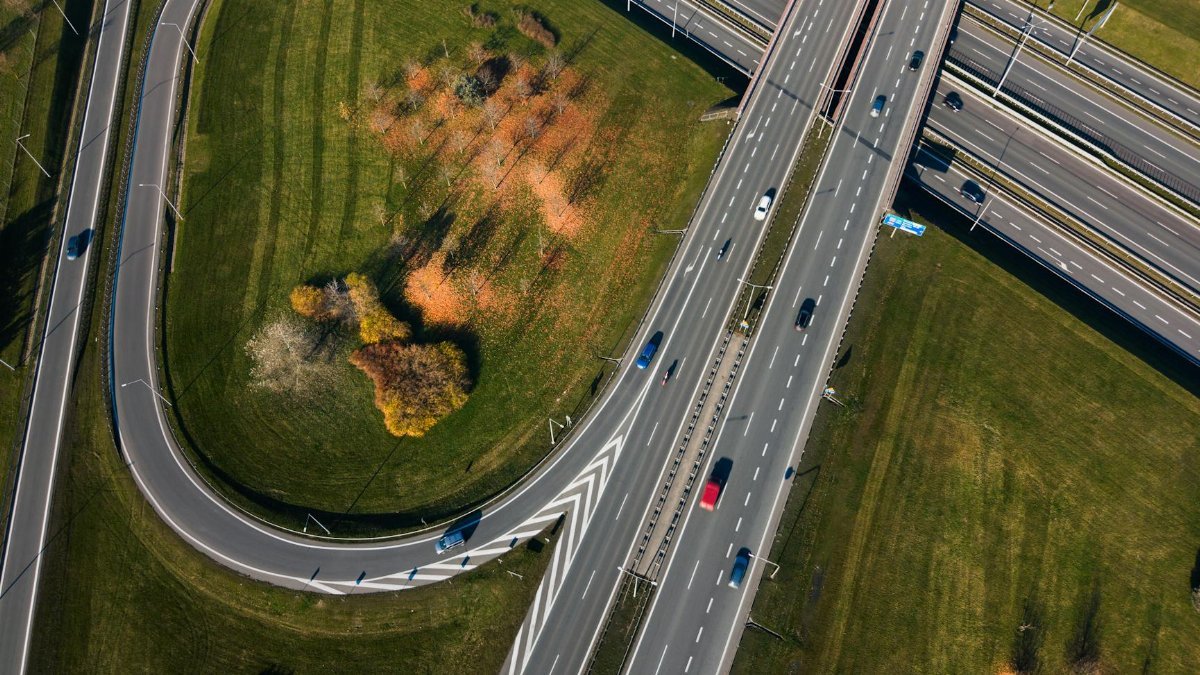 Stunning aerial view of a highway intersection in Poznań, showcasing transportation infrastructure.