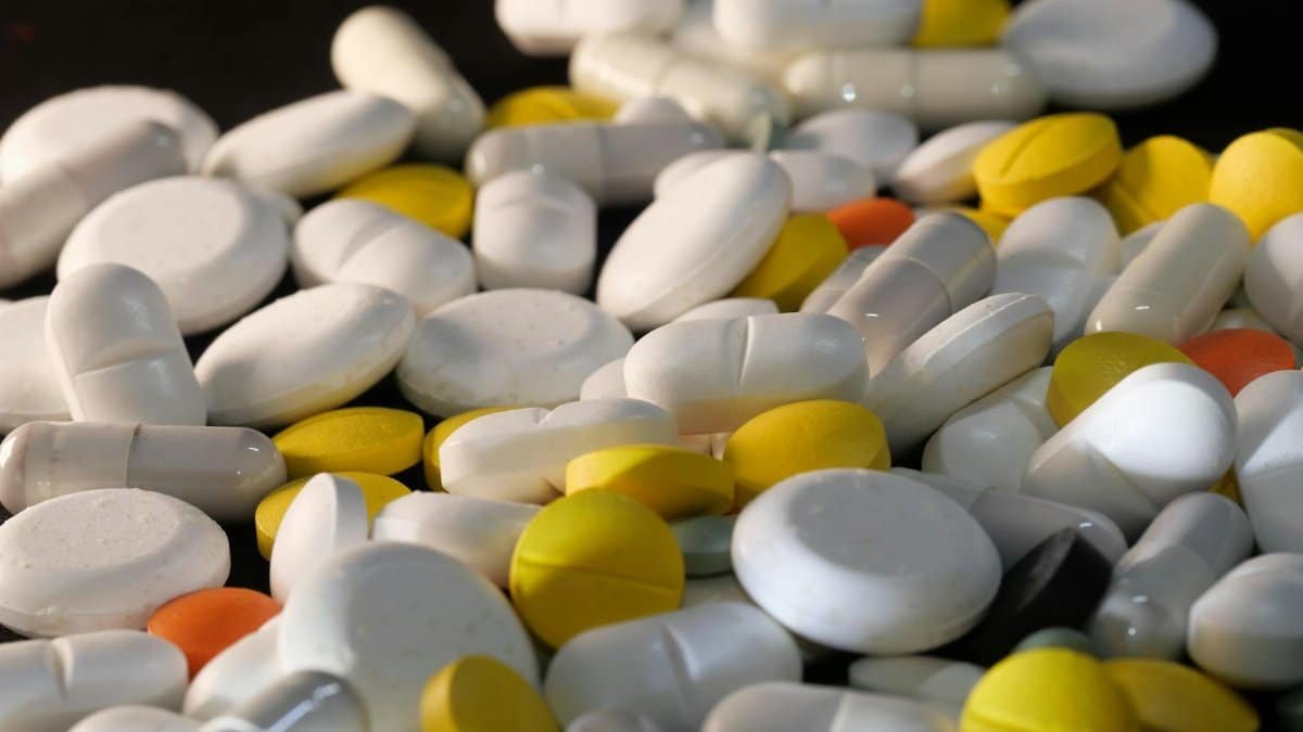 A close-up shot of various capsules and tablets, illustrating healthcare and medication concepts.