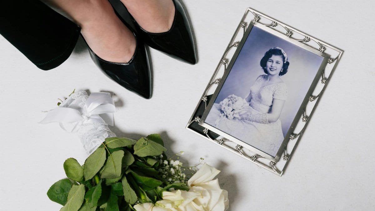 Elegant wedding image featuring black pumps and a vintage bridal portrait.
