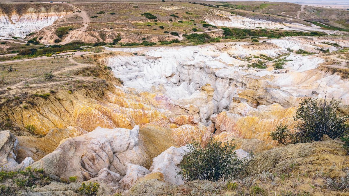 Scenic view of vibrant geological formations in a rugged canyon landscape.