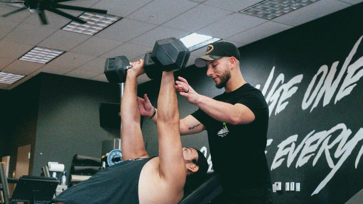 Indoor personal training session focusing on strength training and core workout.