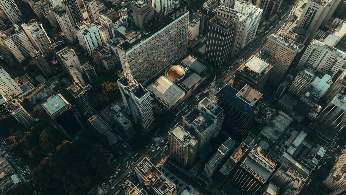Stunning aerial view of skyscrapers and bustling streets in São Paulo city.