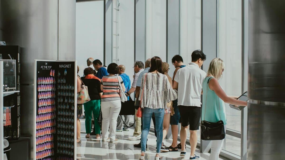 Visitors enjoying the view from the Burj Khalifa observation deck in Dubai.