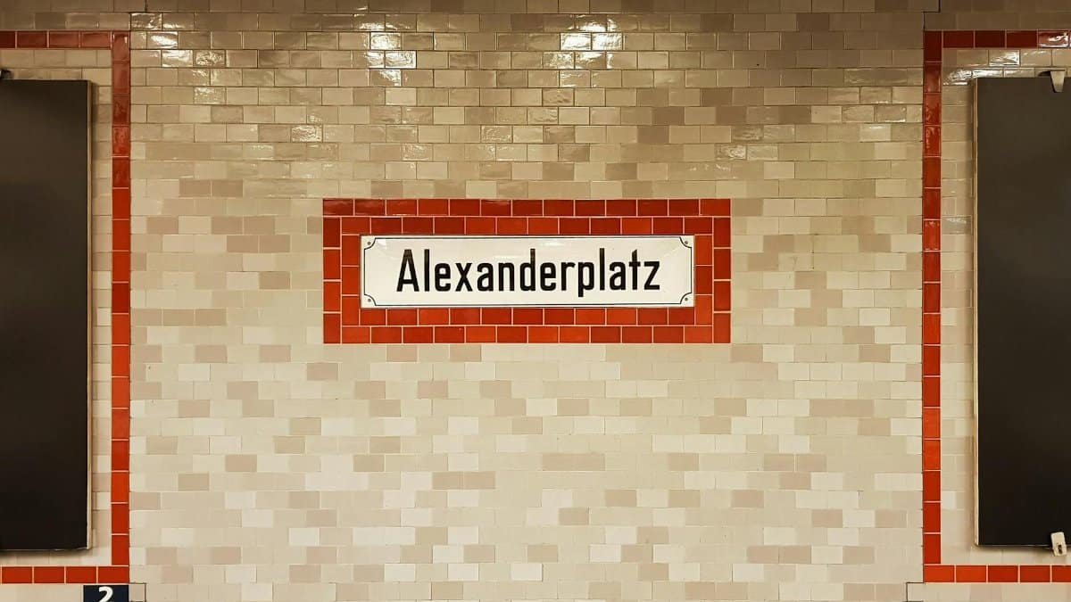 Alexanderplatz sign on tile wall at Berlin metro station, Germany.