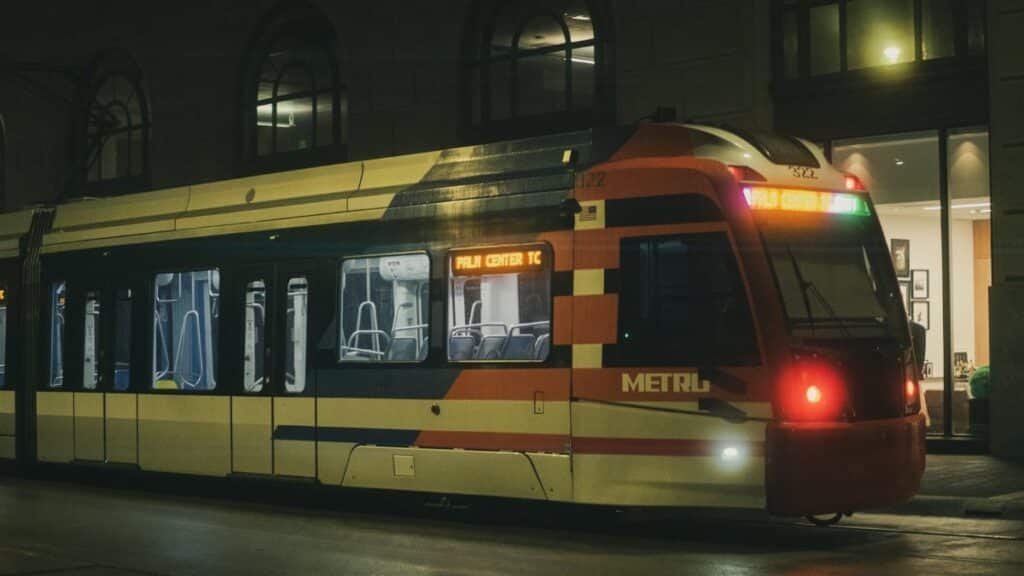 A METRO train in Houston at night, showcasing urban transportation in the city's downtown area.