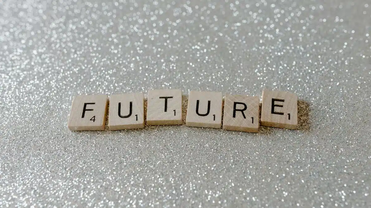 Wooden Scrabble tiles spell 'Future' against a shimmering glitter background.