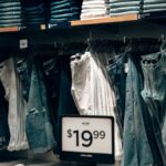 Explore a stylish denim collection at a boutique in Miami, showcasing jeans with discounts.