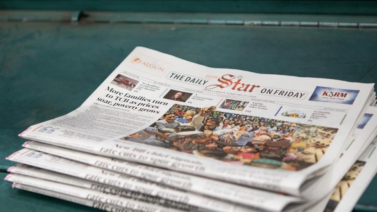 Stack of 'The Daily Star' newspapers showcasing a headline on rising poverty and price issues.