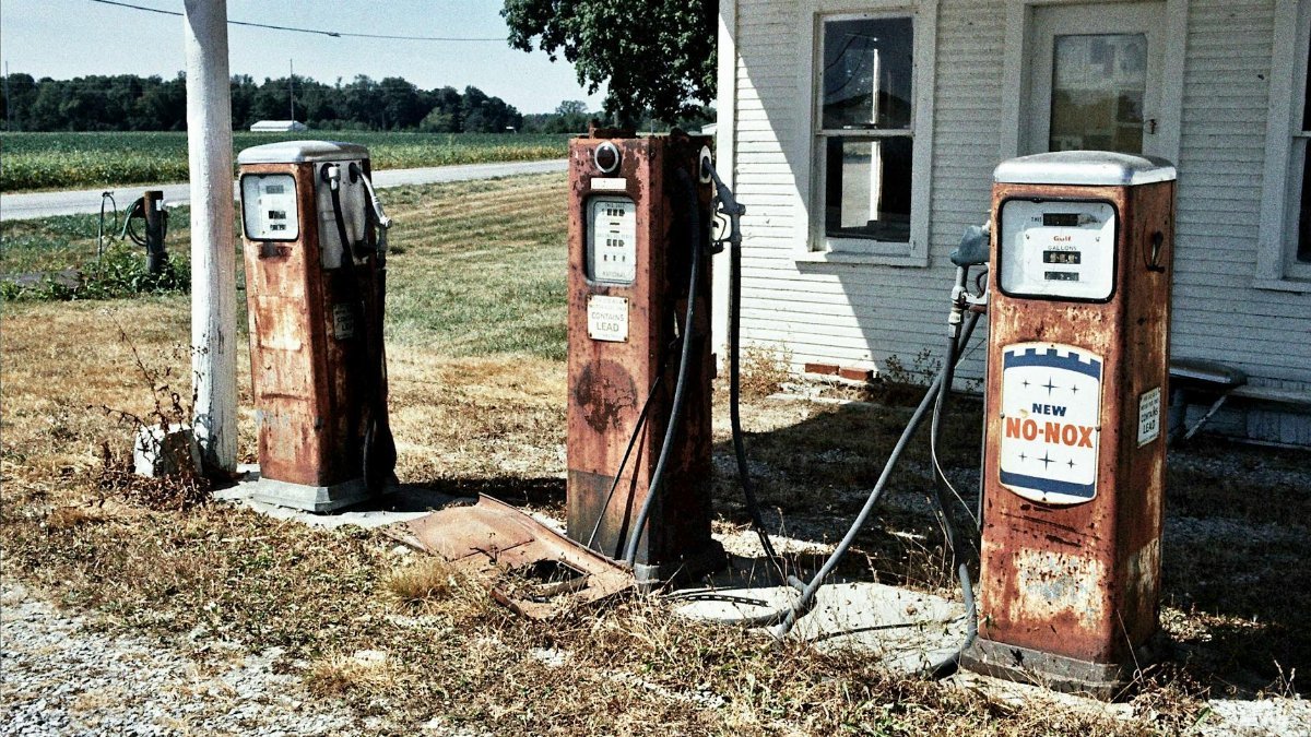 Rustic vintage gas pumps at an old station in Waldo, Ohio.